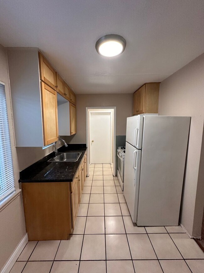7828 International Blvd in Oakland, CA - Building Photo - Building Photo