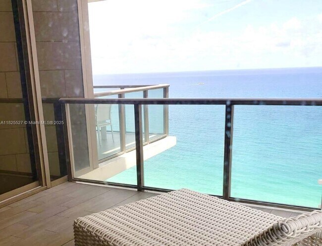property at 9705 Collins Ave