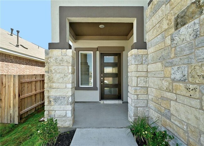 806 Pepperbark Loop in Mustang Ridge, TX - Building Photo - Building Photo