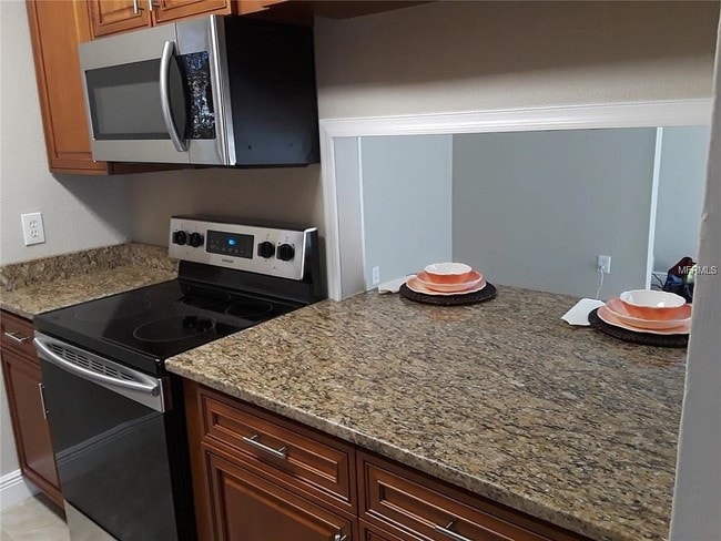 3244 S Semoran Blvd, Unit 11 in Orlando, FL - Building Photo - Building Photo