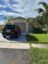 9604 NW 49th St in Sunrise, FL - Building Photo - Building Photo
