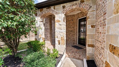 14 Whispering Thicket Pl in Tomball, TX - Building Photo - Building Photo