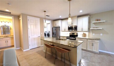 14822 Edgewater Cir in Naples, FL - Building Photo - Building Photo