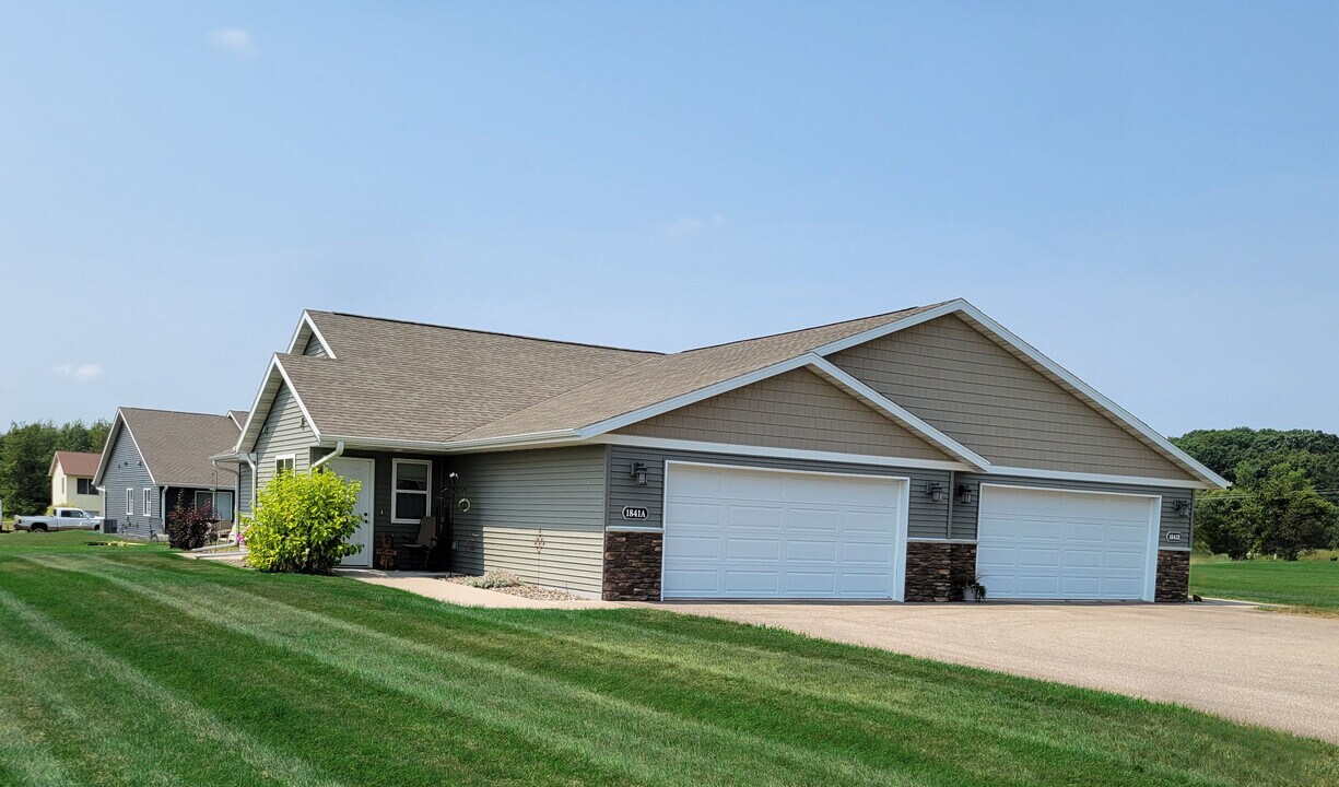 1841 Spruce Ave, Unit Spruce A in Menomonie, WI - Building Photo