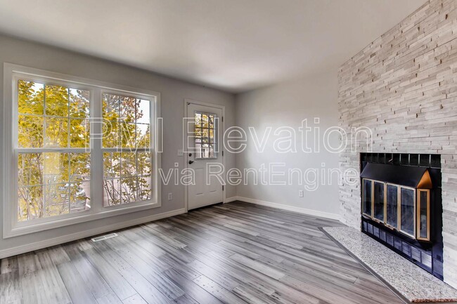 8976 W Dartmouth Pl in Lakewood, CO - Building Photo - Building Photo