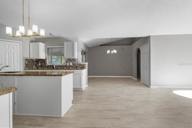 1699 Walker St SE in Palm Bay, FL - Foto de edificio - Building Photo