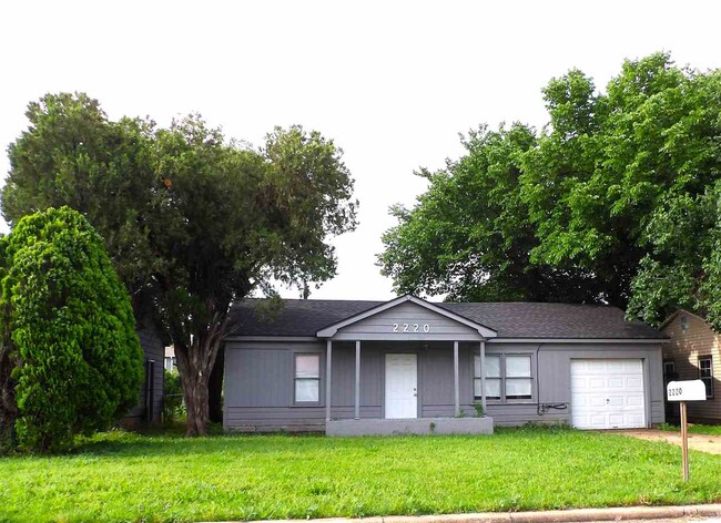 property at 2220 NW Pollard Ave
