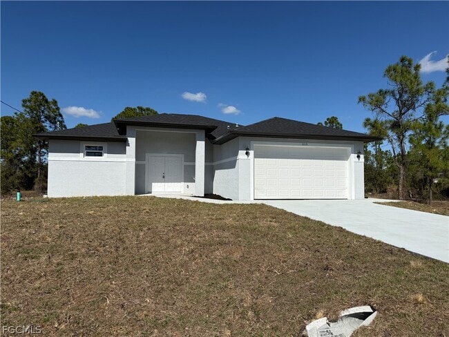 1115 Cove St E in Lehigh Acres, FL - Building Photo - Building Photo