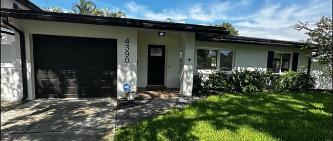 property at 4390 Maple St NE