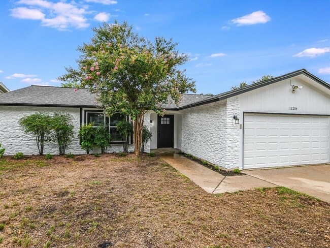 property at 11204 Iron Oak Trail