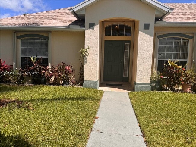1265 SW Santiago Ave in Port St. Lucie, FL - Building Photo - Building Photo