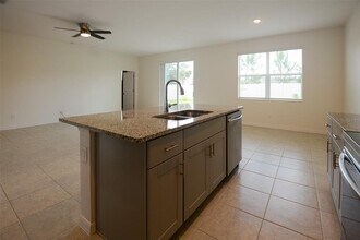 1669 Way of Peace Ln in Mascotte, FL - Building Photo - Building Photo