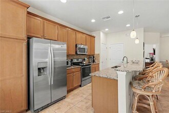 28011 Pisces Ln in Bonita Springs, FL - Foto de edificio - Building Photo