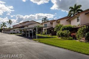 180 Cypress Way E-Unit -C117 in Naples, FL - Building Photo