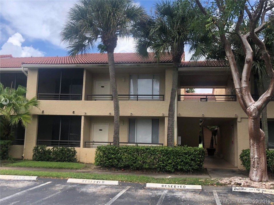 711 Lyons Rd-Unit -14205 in Coconut Creek, FL - Building Photo