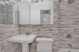 44 E 1st St in New York, NY - Building Photo - Building Photo