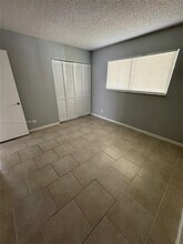 8560 N Sherman Cir, Unit 403 in Miramar, FL - Building Photo - Building Photo