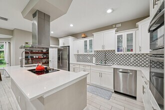 9417 Whippoorwill Trail in Jupiter, FL - Building Photo - Building Photo