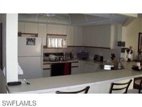 661 Windsurf Ln-Unit -A-103 in Naples, FL - Building Photo - Building Photo