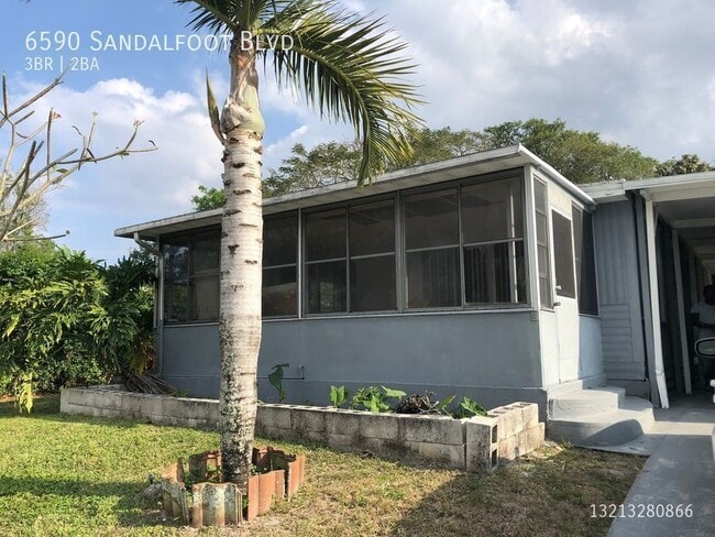 6590 Sandalfoot Blvd in Boca Raton, FL - Building Photo - Building Photo