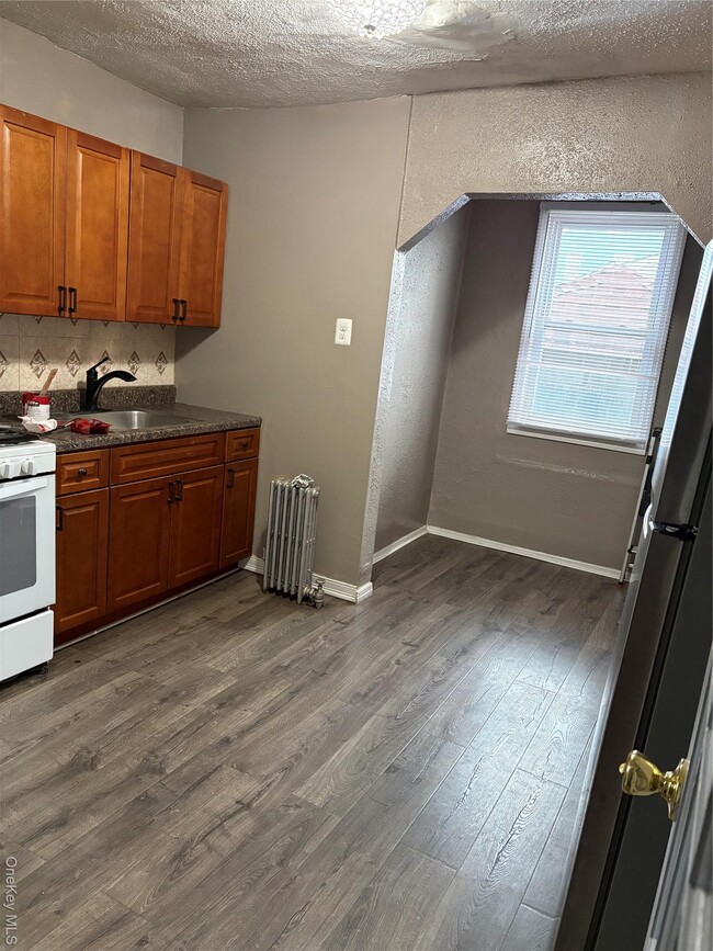 property at 109-11 131st St