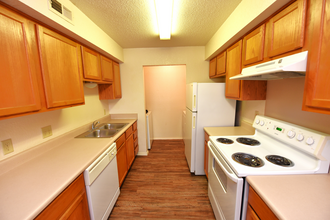 Brookstone Cottages Apartments in Norman, OK - Building Photo - Building Photo