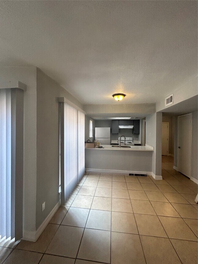 property at 11411 Harwin Dr.