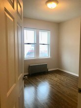 7153 W Grand Ave-Unit -202 in Chicago, IL - Building Photo - Building Photo