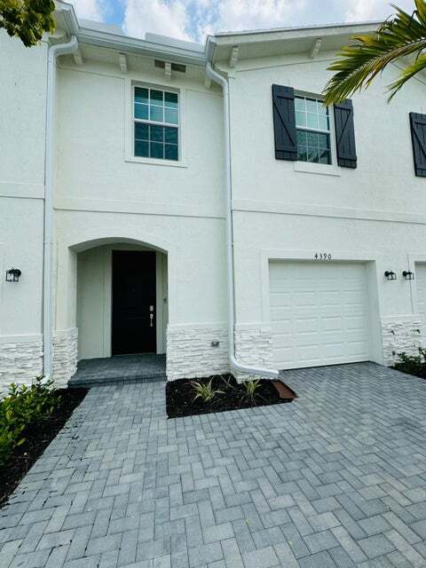 4390 Hammock Grove Dr in Wellington, FL - Building Photo - Building Photo