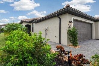 14059 Winding Cedar Wy in Miromar Lakes, FL - Building Photo - Building Photo