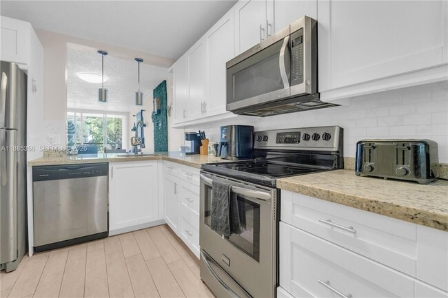 property at 9410 Poinciana Pl