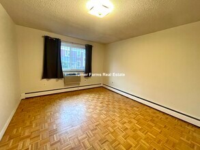 114 Buttonwood St, Unit 1 in Boston, MA - Building Photo - Building Photo