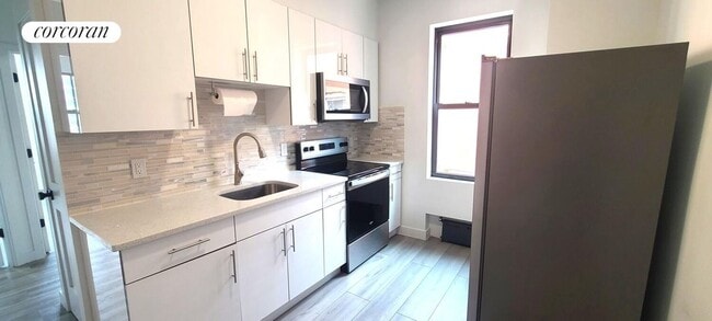 property at 30-56-56 12th St
