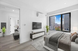 215 E 124th St in New York, NY - Building Photo - Building Photo