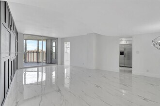 100 Golden Isles Dr, Unit 1410 in Hallandale Beach, FL - Building Photo - Building Photo