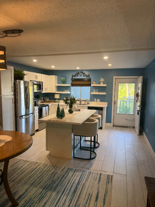 5635 Rattlesnake Hammock Rd in Naples, FL - Building Photo - Building Photo