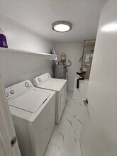 151 Cypress Way E, Unit D-103 in Naples, FL - Building Photo - Building Photo