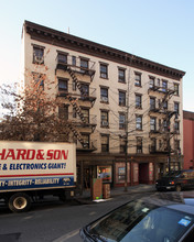 58-60 W 8th St in New York, NY - Building Photo - Building Photo