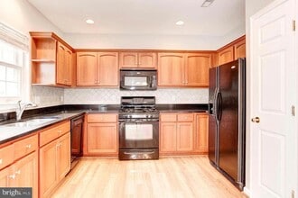 25454 Upper Clubhouse Dr in Chantilly, VA - Building Photo - Building Photo