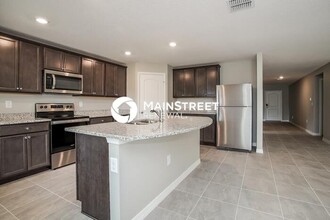1673 Hideaway Flat St in Mascotte, FL - Building Photo - Building Photo