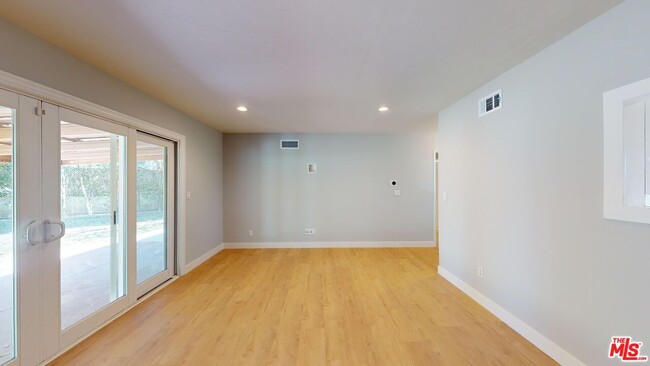 8610 Remmet Ave in Los Angeles, CA - Building Photo - Building Photo