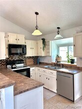 9610 W Chatfield Ave in Littleton, CO - Building Photo - Building Photo