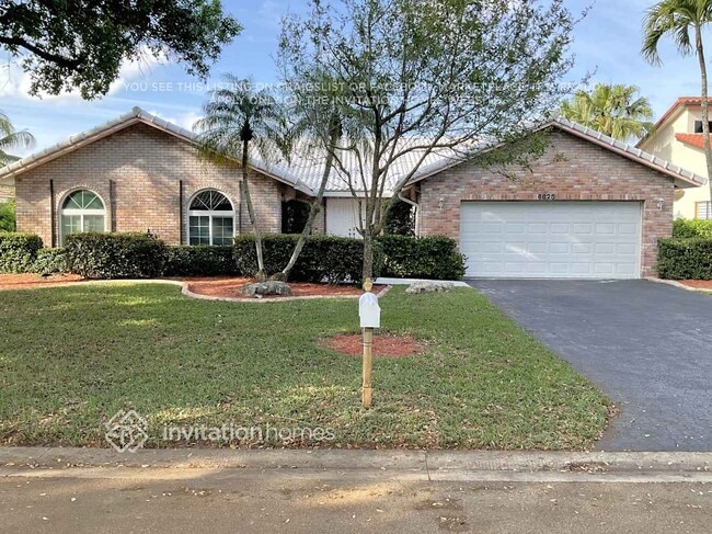 property at 8825 NW 57th Ct