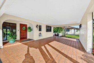 435 Pine Villa Dr in Atlantis, FL - Building Photo - Building Photo