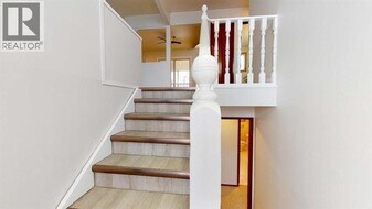 73 Laval Ct W in Lethbridge, AB - Building Photo