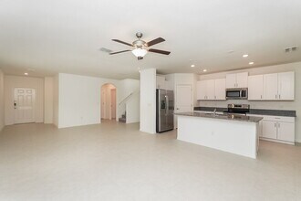 7340 Spring Snowflake Ave in Palm River-Clair Mel, FL - Building Photo - Building Photo