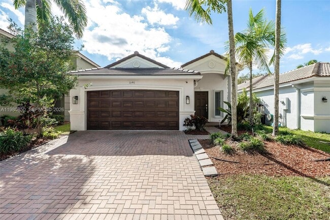 1046 Golden Cane Dr in Weston, FL - Building Photo - Building Photo