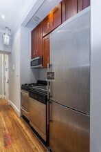 Mott Street in New York, NY - Building Photo - Building Photo