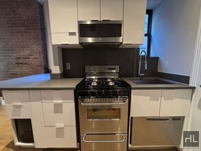 Mott Street in New York, NY - Building Photo - Building Photo