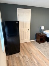 Eldo Suites Apartments in El Dorado Springs, MO - Building Photo - Building Photo